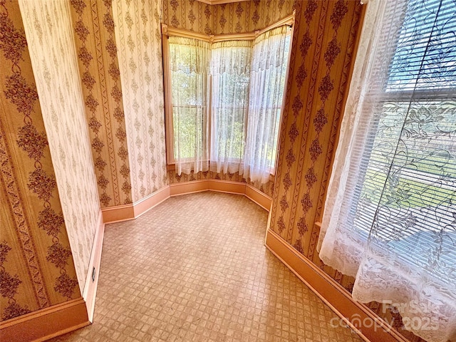4689 Lakeview Acres Rd, Valdese, NC 28690 - empty room with baseboards and wallpapered walls