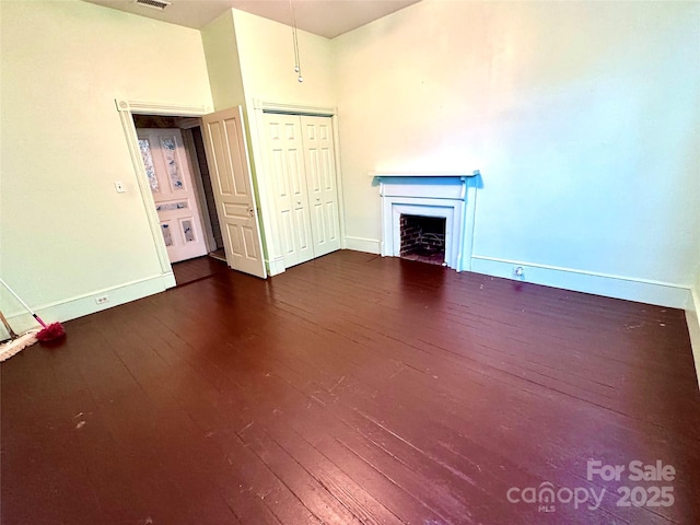 4689 Lakeview Acres Rd, Valdese, NC 28690 - unfurnished living room featuring a fireplace and dark wood finished floors