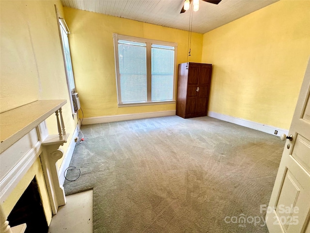 4689 Lakeview Acres Rd, Valdese, NC 28690 - empty room with carpet flooring, ceiling fan, and a fireplace
