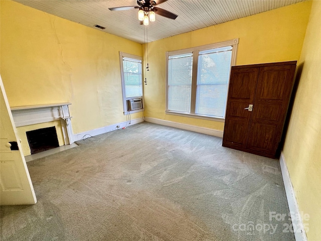 4689 Lakeview Acres Rd, Valdese, NC 28690 - unfurnished living room featuring a ceiling fan, carpet floors, and a fireplace with flush hearth