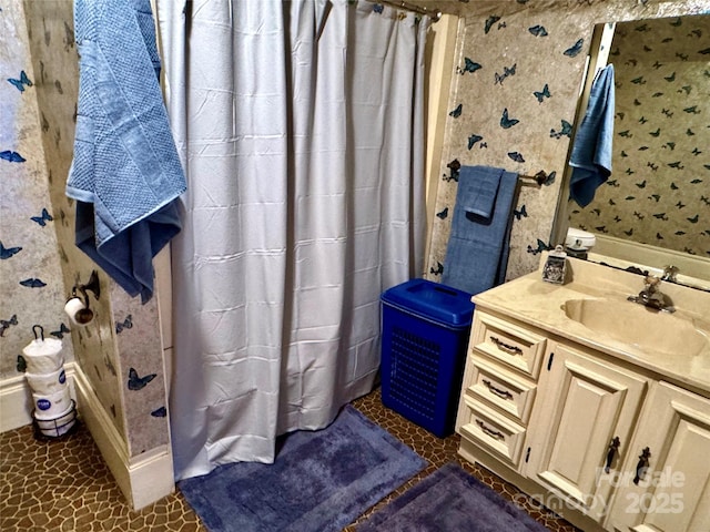 4689 Lakeview Acres Rd, Valdese, NC 28690 - bathroom featuring vanity, curtained shower, and wallpapered walls