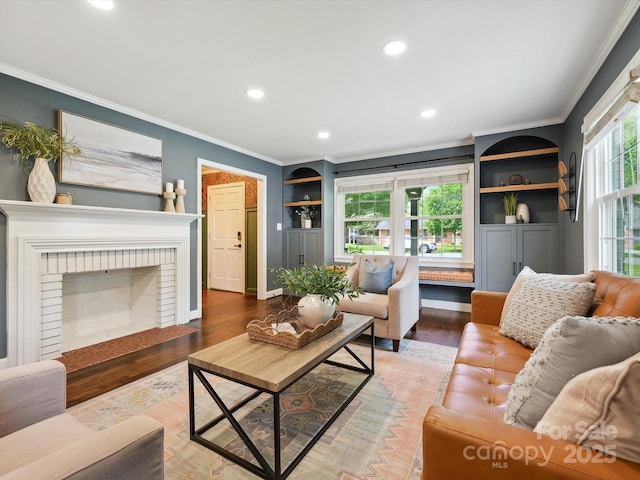 827 Fairbanks Rd, Charlotte, NC 28210 - living room with ornamental molding, recessed lighting, light wood-type flooring, a fireplace, and baseboards