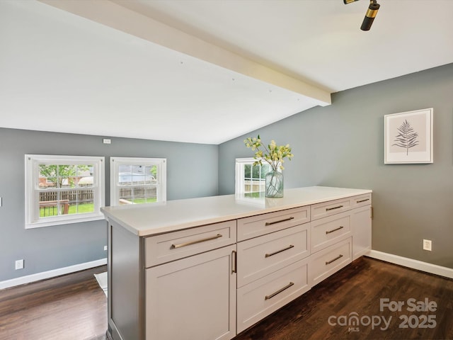 827 Fairbanks Rd, Charlotte, NC 28210 - kitchen featuring dark wood finished floors, light countertops, baseboards, and white cabinets