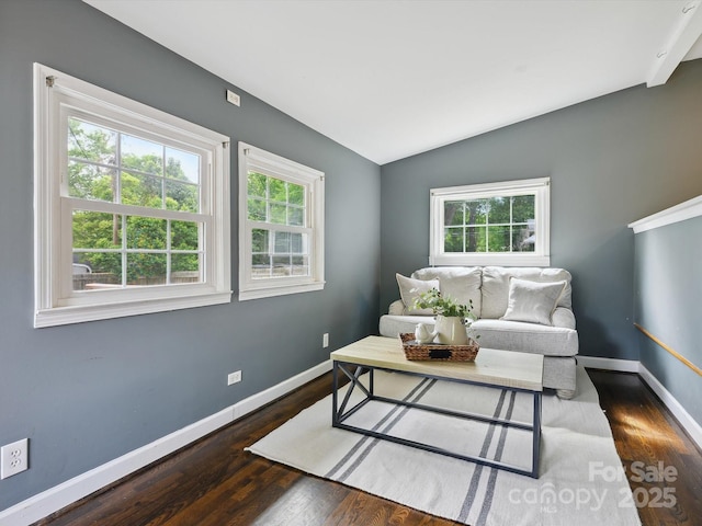 827 Fairbanks Rd, Charlotte, NC 28210 - living room featuring healthy amount of natural light, lofted ceiling, wood finished floors, and baseboards