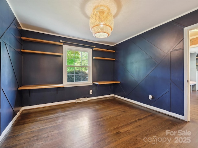 827 Fairbanks Rd, Charlotte, NC 28210 - unfurnished room with wood finished floors, baseboards, and ornamental molding
