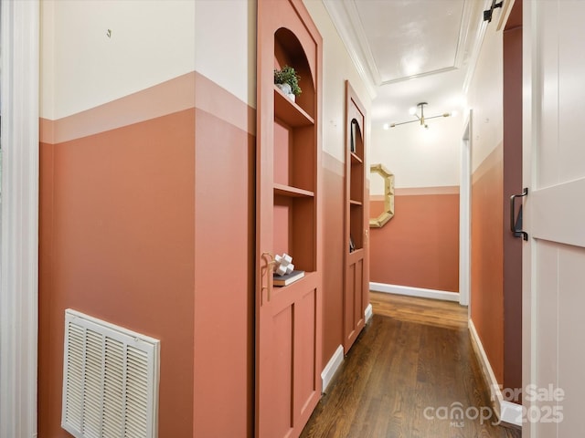 827 Fairbanks Rd, Charlotte, NC 28210 - hallway featuring dark wood-style floors and built in shelves