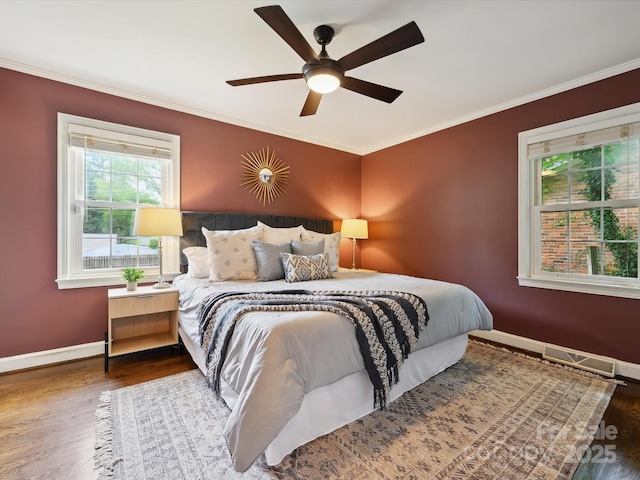 827 Fairbanks Rd, Charlotte, NC 28210 - bedroom featuring wood finished floors, ornamental molding, baseboards, and ceiling fan