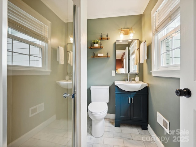 827 Fairbanks Rd, Charlotte, NC 28210 - full bathroom featuring toilet, baseboards, crown molding, and vanity