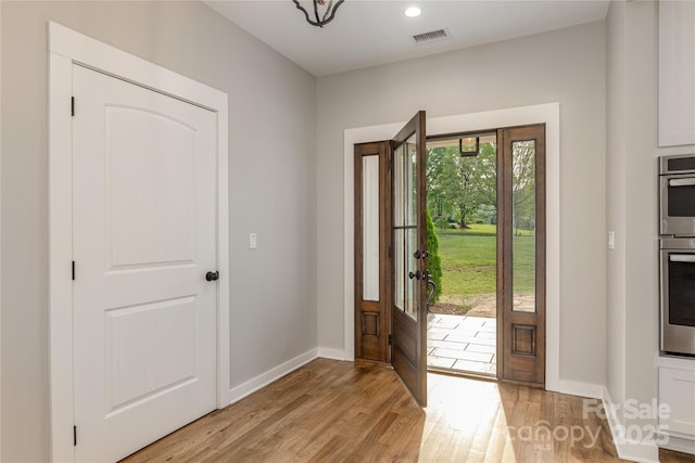 467 Dale Rd, Spruce Pine, NC 28777 - foyer with light wood-style flooring, baseboards, and recessed lighting