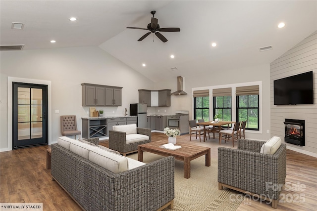 467 Dale Rd, Spruce Pine, NC 28777 - living area with high vaulted ceiling, ceiling fan, wood finished floors, recessed lighting, and a large fireplace