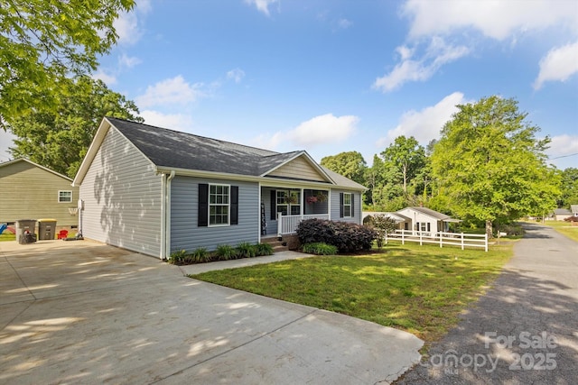 835 Jet St, Kannapolis, NC 28081 - ranch-style home featuring a porch, a shingled roof, and concrete driveway
