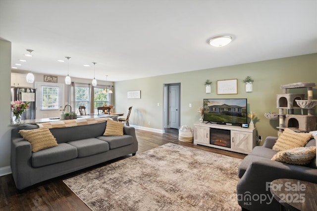 835 Jet St, Kannapolis, NC 28081 - living room featuring baseboards, dark wood-style floors, and recessed lighting