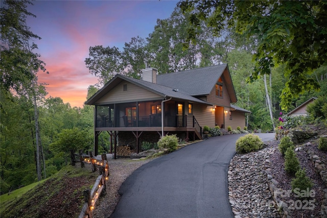 268 Trappers Run Dr, Burnsville, NC 28714 - chalet / cabin featuring a sunroom and a chimney