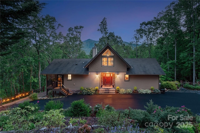 268 Trappers Run Dr, Burnsville, NC 28714 - rustic home with a chimney