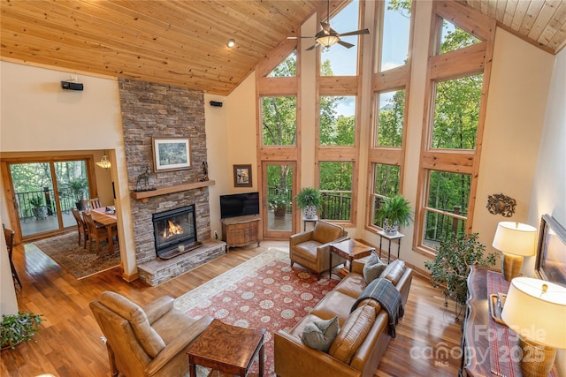 268 Trappers Run Dr, Burnsville, NC 28714 - living room with high vaulted ceiling, ceiling fan, wooden ceiling, a fireplace, and wood finished floors