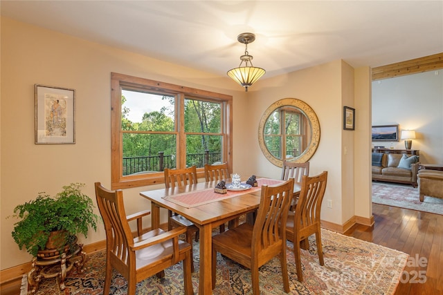 268 Trappers Run Dr, Burnsville, NC 28714 - dining area featuring dark wood-style floors and baseboards