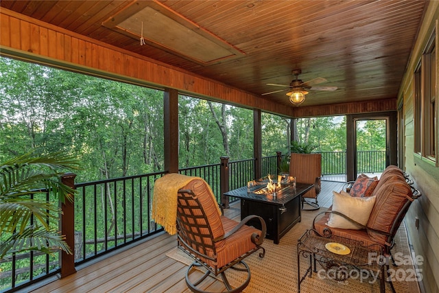 268 Trappers Run Dr, Burnsville, NC 28714 - sunroom / solarium with a ceiling fan and an outdoor living space with a fire pit