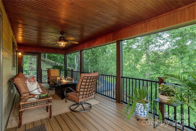 268 Trappers Run Dr, Burnsville, NC 28714 - sunroom / solarium with ceiling fan and an outdoor living space with a fire pit