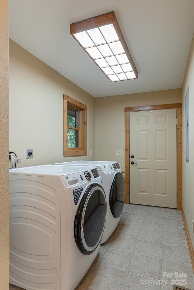 268 Trappers Run Dr, Burnsville, NC 28714 - laundry area with separate washer and dryer and light tile patterned floors