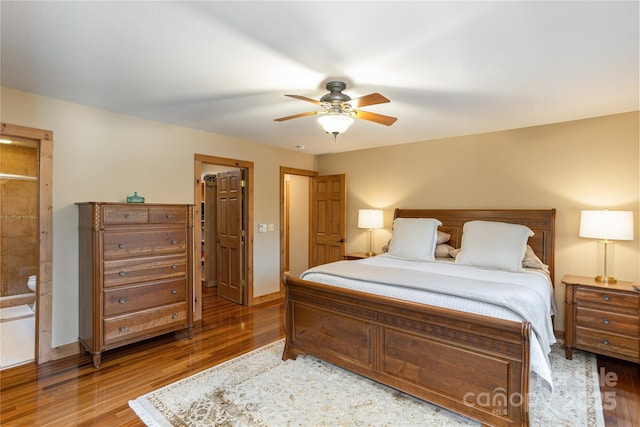 268 Trappers Run Dr, Burnsville, NC 28714 - bedroom with wood finished floors, baseboards, and ceiling fan