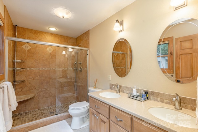 268 Trappers Run Dr, Burnsville, NC 28714 - bathroom with double vanity, toilet, and a stall shower