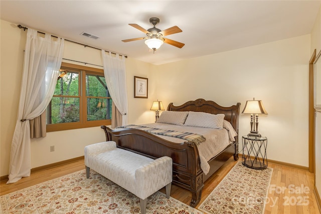 268 Trappers Run Dr, Burnsville, NC 28714 - bedroom featuring wood finished floors, baseboards, and a ceiling fan