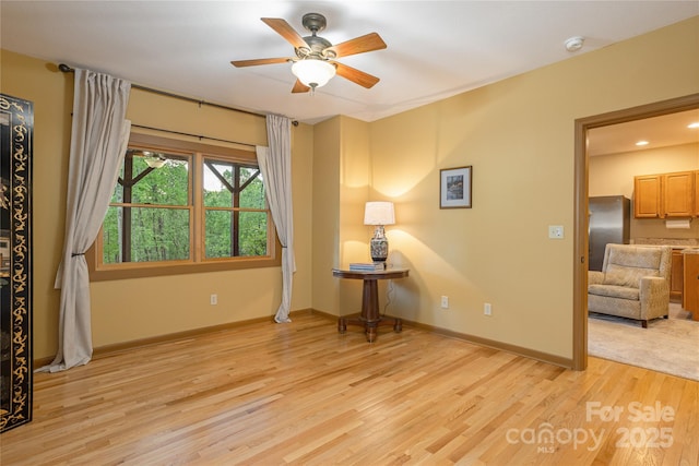 268 Trappers Run Dr, Burnsville, NC 28714 - empty room with light wood-style flooring, a ceiling fan, a smoke detector, baseboards, and recessed lighting