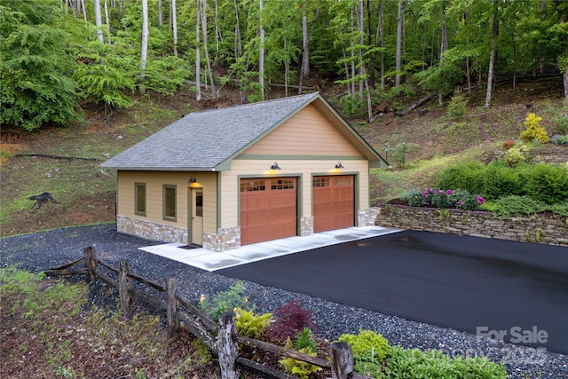 268 Trappers Run Dr, Burnsville, NC 28714 - detached garage featuring a wooded view