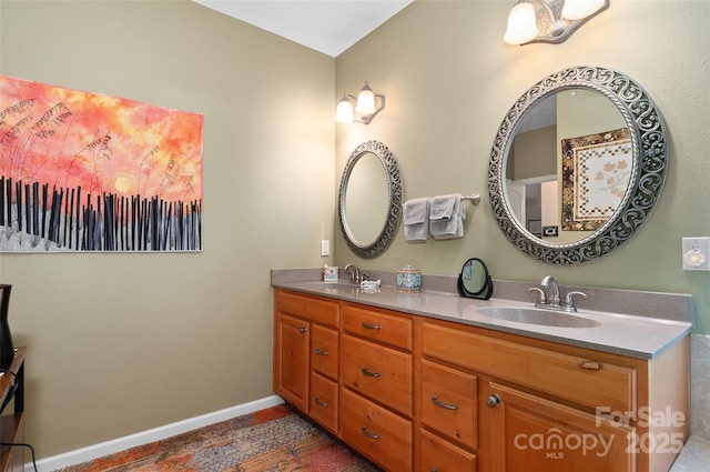 399 Stepping Stone Ln, Waynesville, NC 28786 - bathroom with double vanity and baseboards