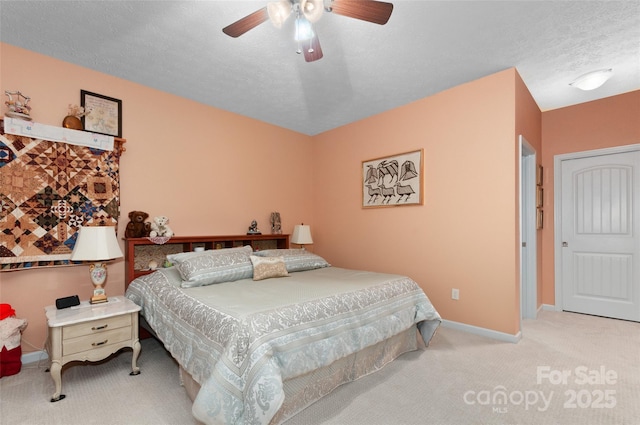 399 Stepping Stone Ln, Waynesville, NC 28786 - bedroom with carpet flooring, ceiling fan, and a textured ceiling