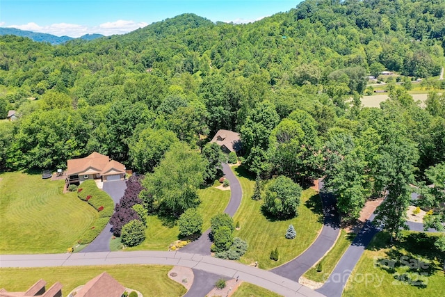 399 Stepping Stone Ln, Waynesville, NC 28786 - aerial view of property and surrounding area with a forest and a mountainous background