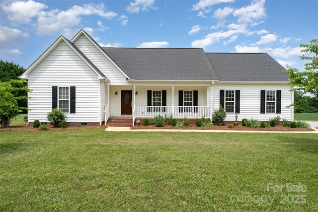 6201 New Hope Church Rd, Marshville, NC 28103 - view of front of house with covered porch, a front yard, crawl space, and a shingled roof