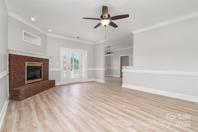 6201 New Hope Church Rd, Marshville, NC 28103 - unfurnished living room with light wood finished floors, a fireplace, ornamental molding, a ceiling fan, and baseboards