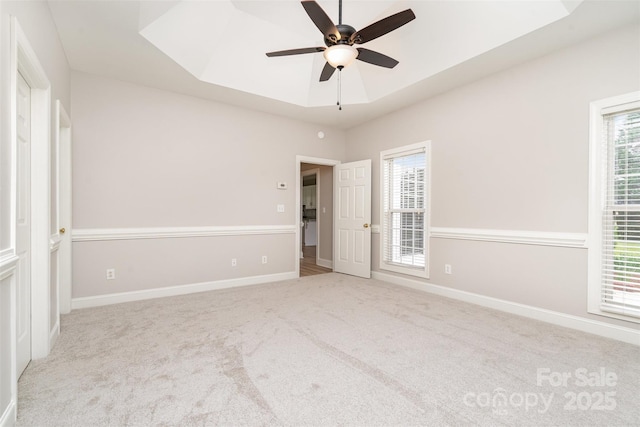 6201 New Hope Church Rd, Marshville, NC 28103 - unfurnished bedroom featuring carpet, multiple windows, baseboards, and a ceiling fan