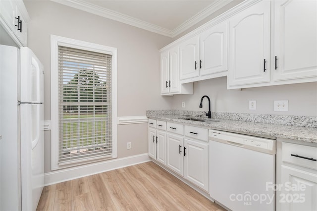 6201 New Hope Church Rd, Marshville, NC 28103 - kitchen with white appliances, a sink, crown molding, light wood finished floors, and baseboards