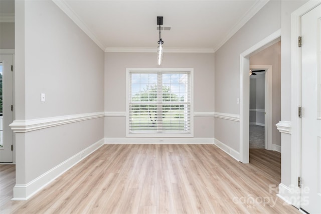 6201 New Hope Church Rd, Marshville, NC 28103 - unfurnished dining area with light wood-style flooring, ornamental molding, and baseboards