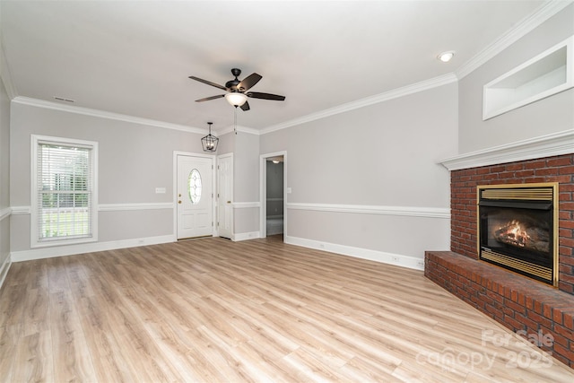 6201 New Hope Church Rd, Marshville, NC 28103 - unfurnished living room with ceiling fan, a fireplace, wood finished floors, baseboards, and ornamental molding