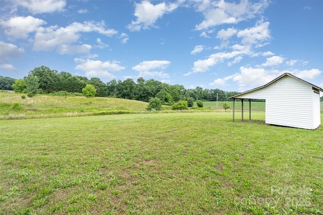 6201 New Hope Church Rd, Marshville, NC 28103 - view of grassy yard featuring an outbuilding