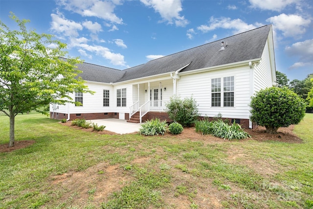 6201 New Hope Church Rd, Marshville, NC 28103 - rear view of house with crawl space, a patio area, a lawn, and roof with shingles