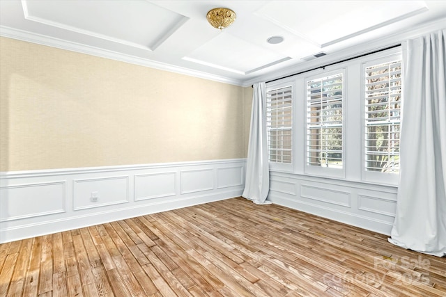 11052 Preservation Park Dr, Charlotte, NC 28214 - spare room with ornamental molding, light wood-style floors, a wainscoted wall, and a decorative wall
