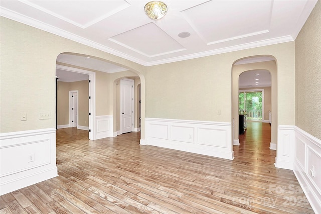 11052 Preservation Park Dr, Charlotte, NC 28214 - empty room with a wainscoted wall, light wood-style flooring, crown molding, and a decorative wall