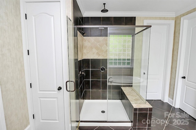 11052 Preservation Park Dr, Charlotte, NC 28214 - full bath with a stall shower, crown molding, a bath, tile patterned flooring, and baseboards