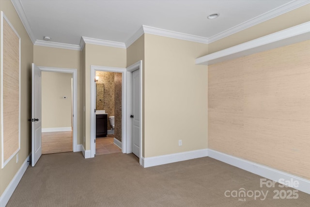 11052 Preservation Park Dr, Charlotte, NC 28214 - unfurnished bedroom featuring carpet flooring, ornamental molding, baseboards, and connected bathroom