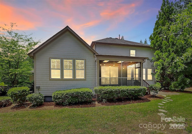 11052 Preservation Park Dr, Charlotte, NC 28214 - back of property featuring a sunroom and a yard