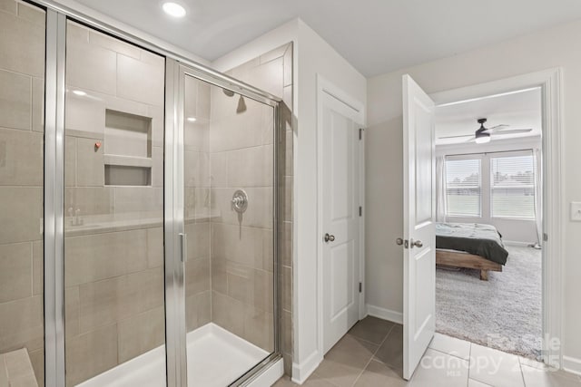 15023 Longmoore Dr, Charlotte, NC 28278 - ensuite bathroom with tile patterned flooring, baseboards, a shower stall, a ceiling fan, and recessed lighting