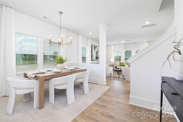 32616 Millingport Rd Unit 7144, New London, NC 28127 - dining room with light wood finished floors, a chandelier, recessed lighting, ceiling fan, and ornate columns