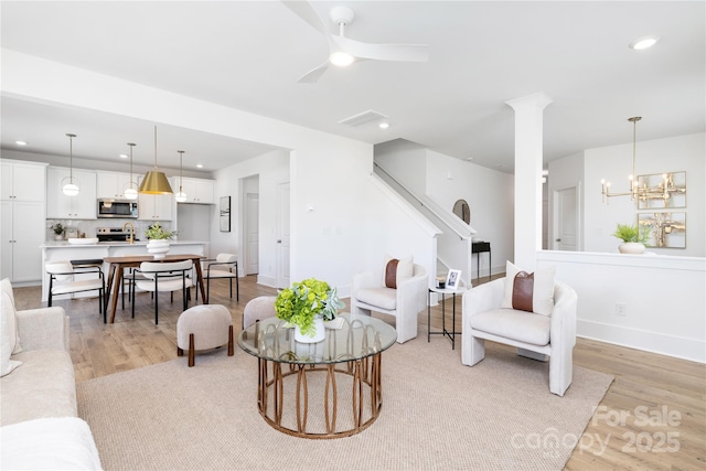 32616 Millingport Rd Unit 7144, New London, NC 28127 - living area featuring light wood-type flooring, stairs, recessed lighting, and ceiling fan