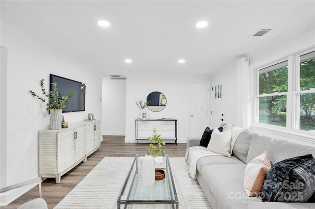 9826 Meringue Pl Unit 15, Charlotte, NC 28270 - living room featuring recessed lighting, wood finished floors, baseboards, and crown molding
