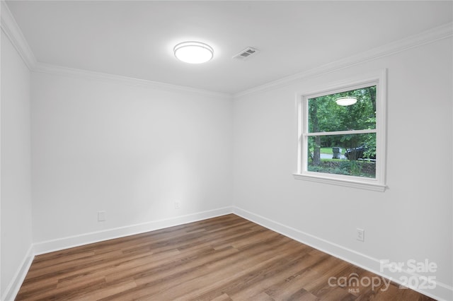 9826 Meringue Pl Unit 15, Charlotte, NC 28270 - unfurnished room with baseboards, wood finished floors, and ornamental molding
