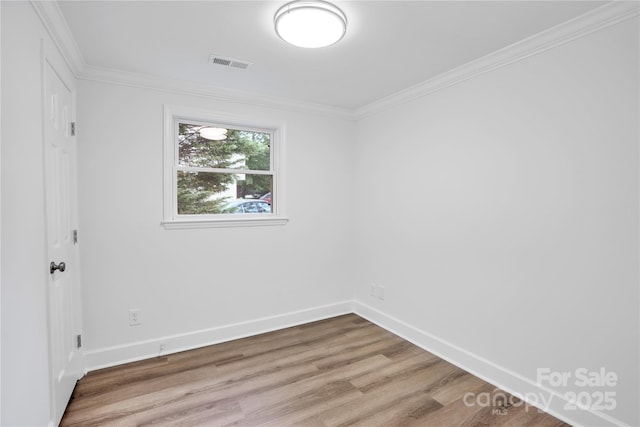 9826 Meringue Pl Unit 15, Charlotte, NC 28270 - unfurnished room featuring wood finished floors, crown molding, and baseboards